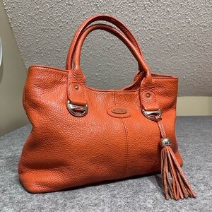 Bric's Orange Pebbled Leather Shoulder Tote with Tassel